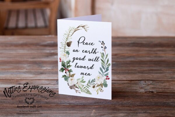 6.25x9.25-Peace-on-earth-good-will-toward-men-wreath-1front_cdd558ea-4def-4d8a-a1b6-e10fd6ff17e8 Peace on earth, good will toward men - Greeting Card - Netties Expressions